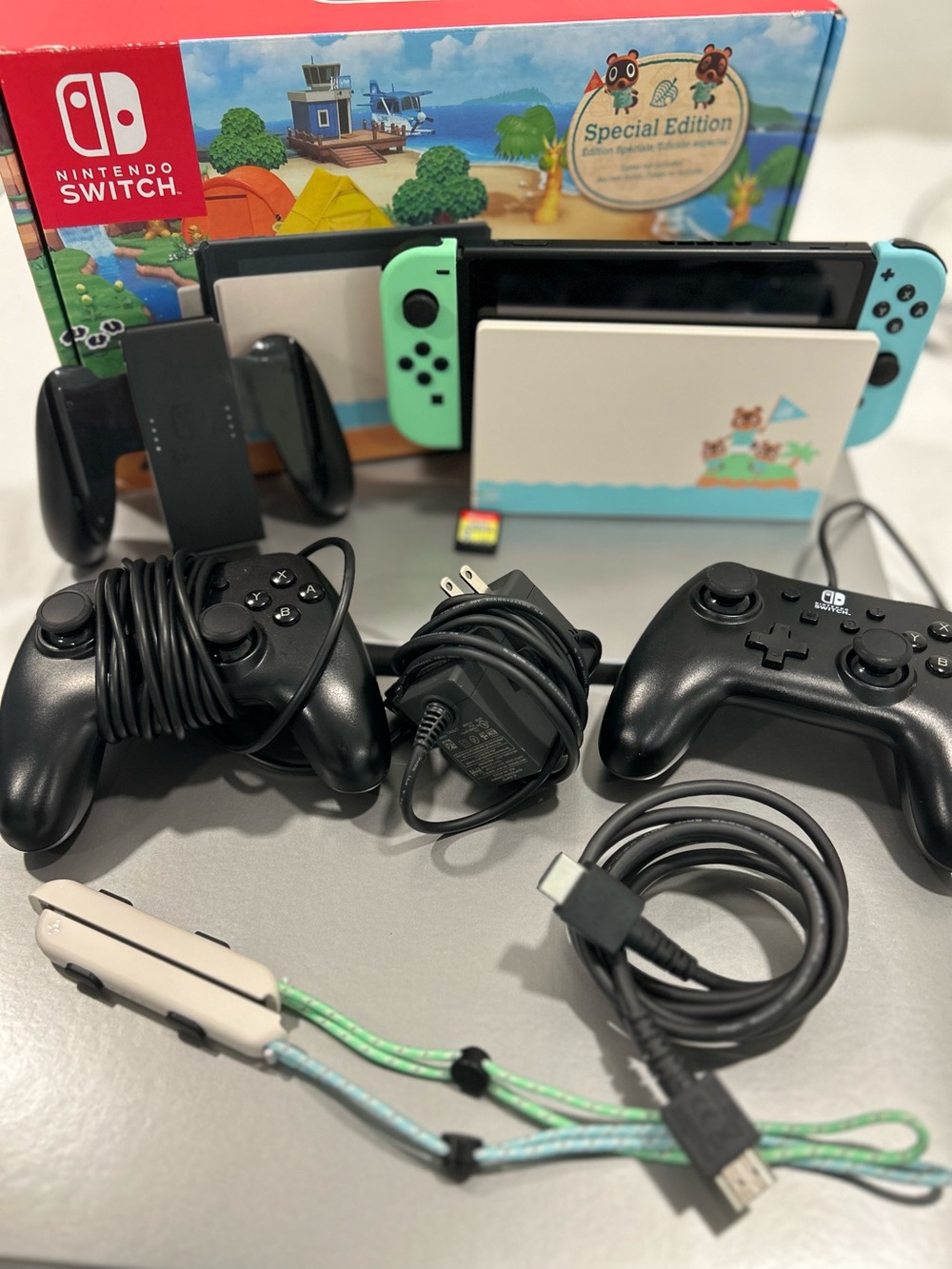 Nintendo Switch Animal Crossing Special Edition Bundle + Super Mario Bros U